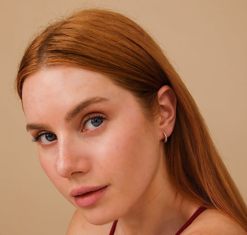 Crossed Huggies | 925 Zilver & Vermeil