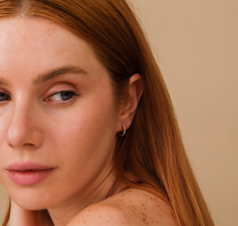 Crossed Huggies | 925 Zilver & Vermeil